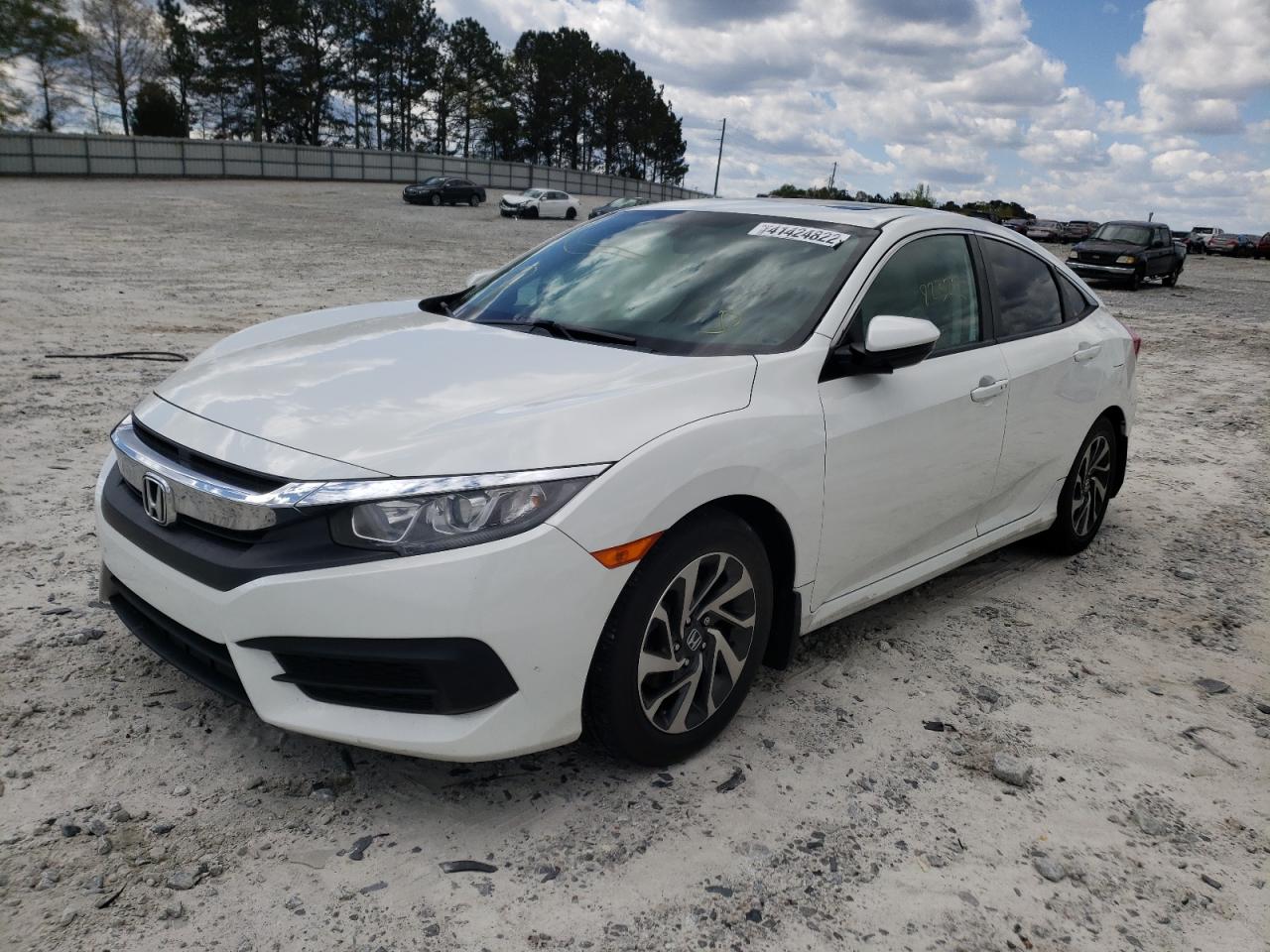 Фото 2 с аукциона – 2017 HONDA CIVIC EX с VIN 19XFC2F79HE020025