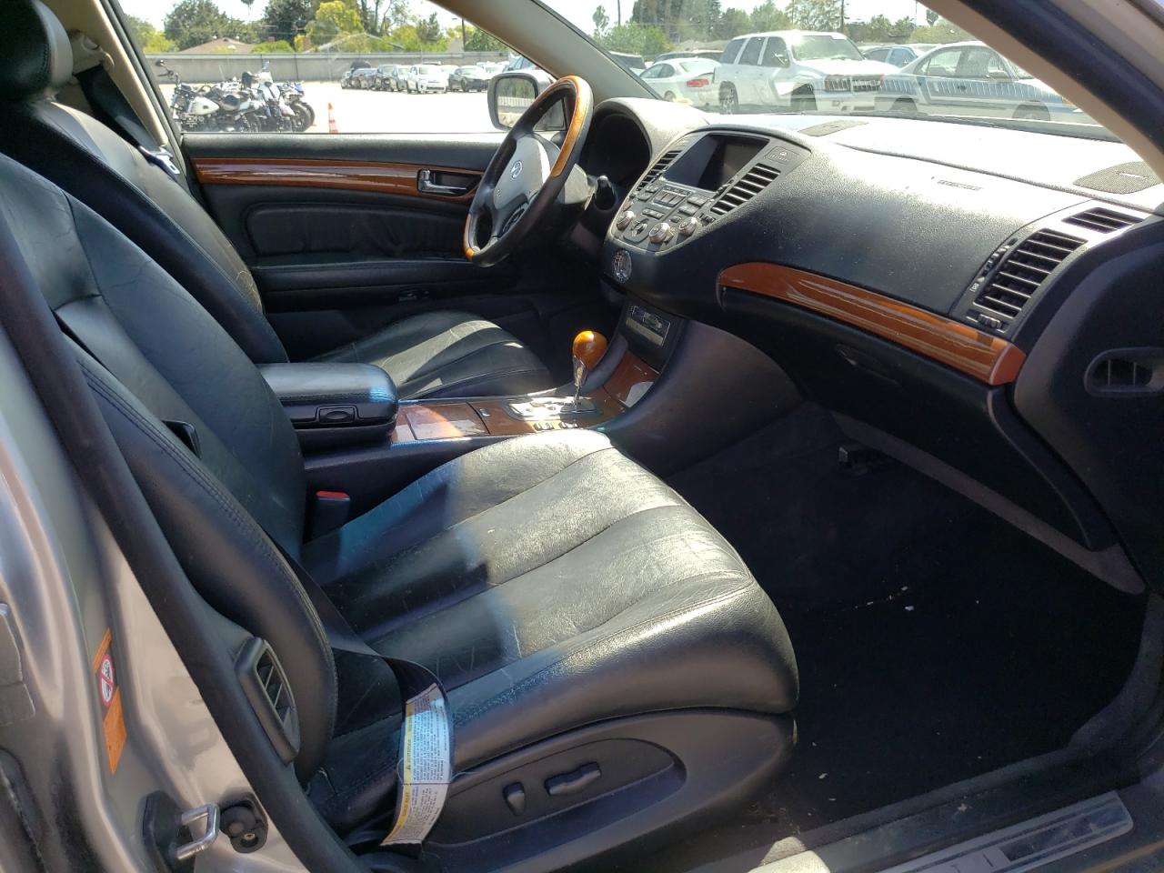 Photo 5 from auction – 2002 INFINITI Q45 with VIN JNKBF01A22M007427