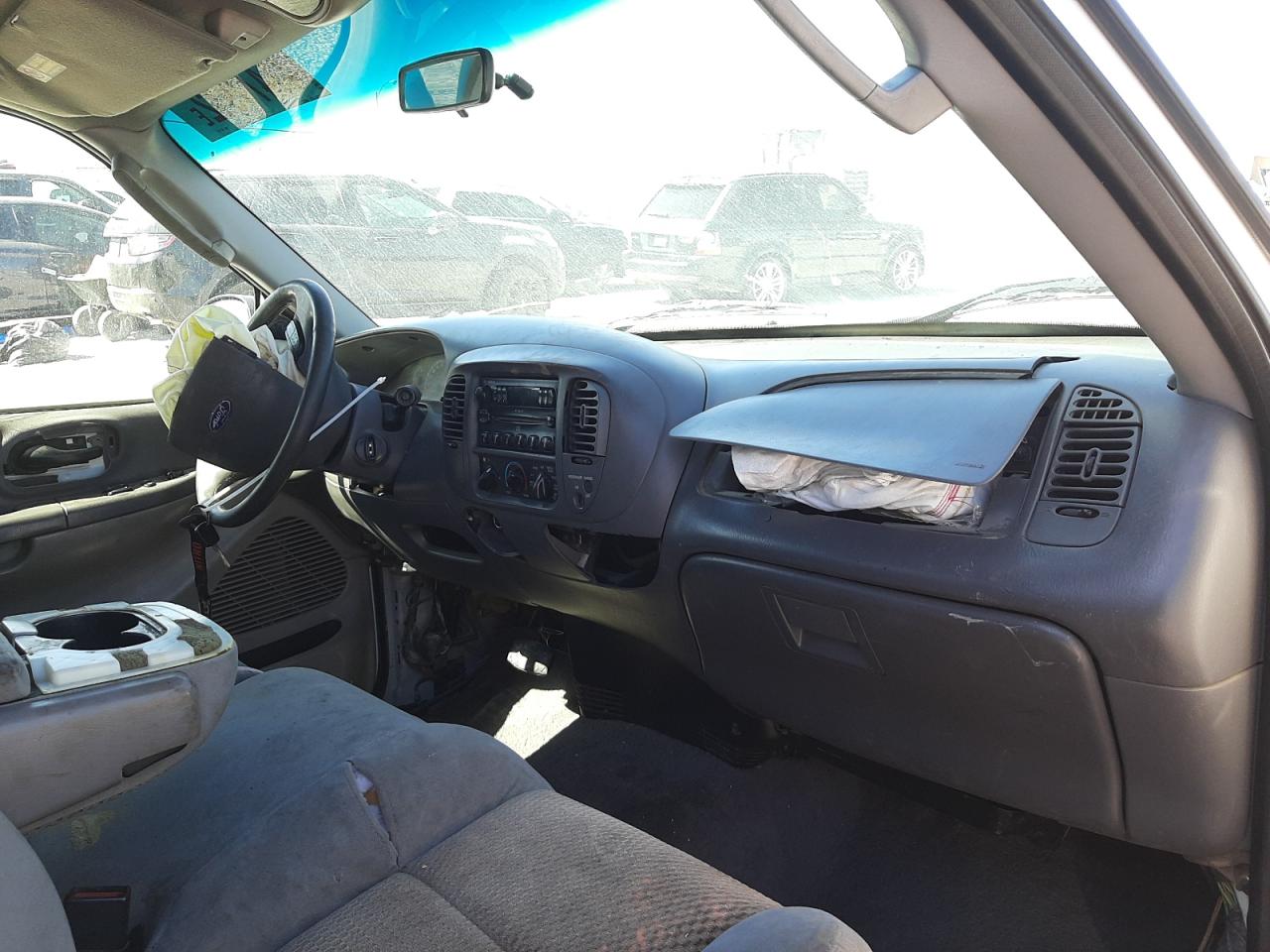 Photo 9 from auction – 2003 FORD F150 with VIN 2FTRX17W23CA67716