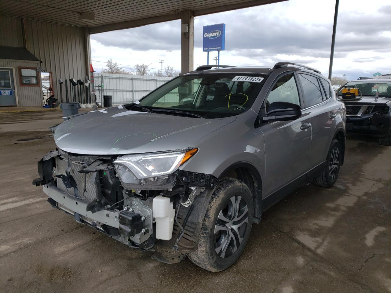 Photo 2 from auction – 2018 TOYOTA RAV4 LE with VIN JTMBFREV1JJ254909
