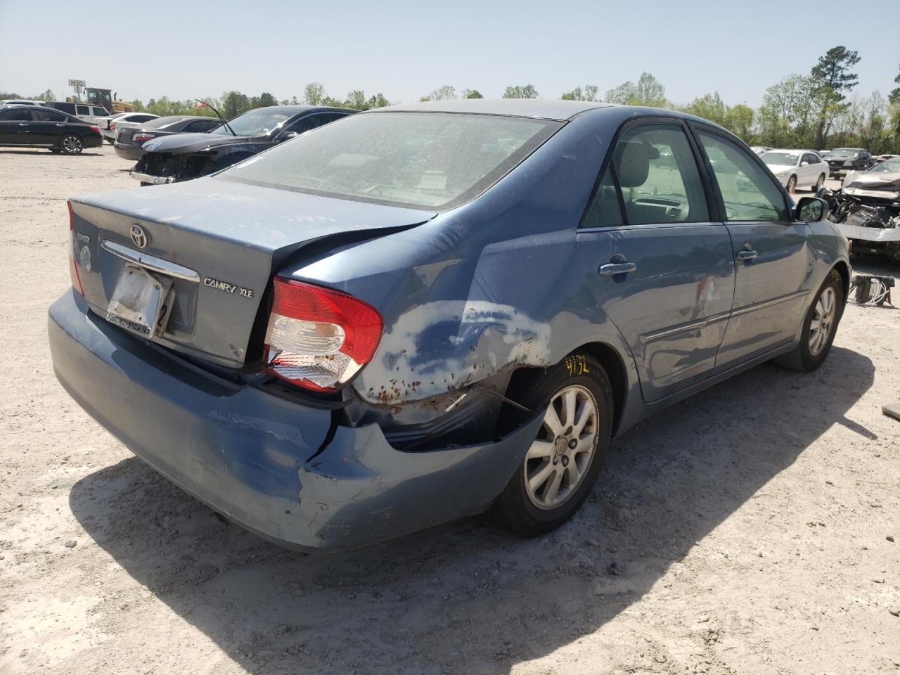 Photo 4 from auction – 2002 TOYOTA CAMRY LE with VIN JTDBE30KX20097594