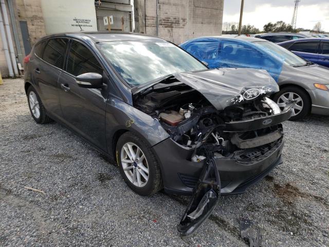 FORD FOCUS SE 2017 with VIN 1FADP3K27HL338752 - Photo from auction