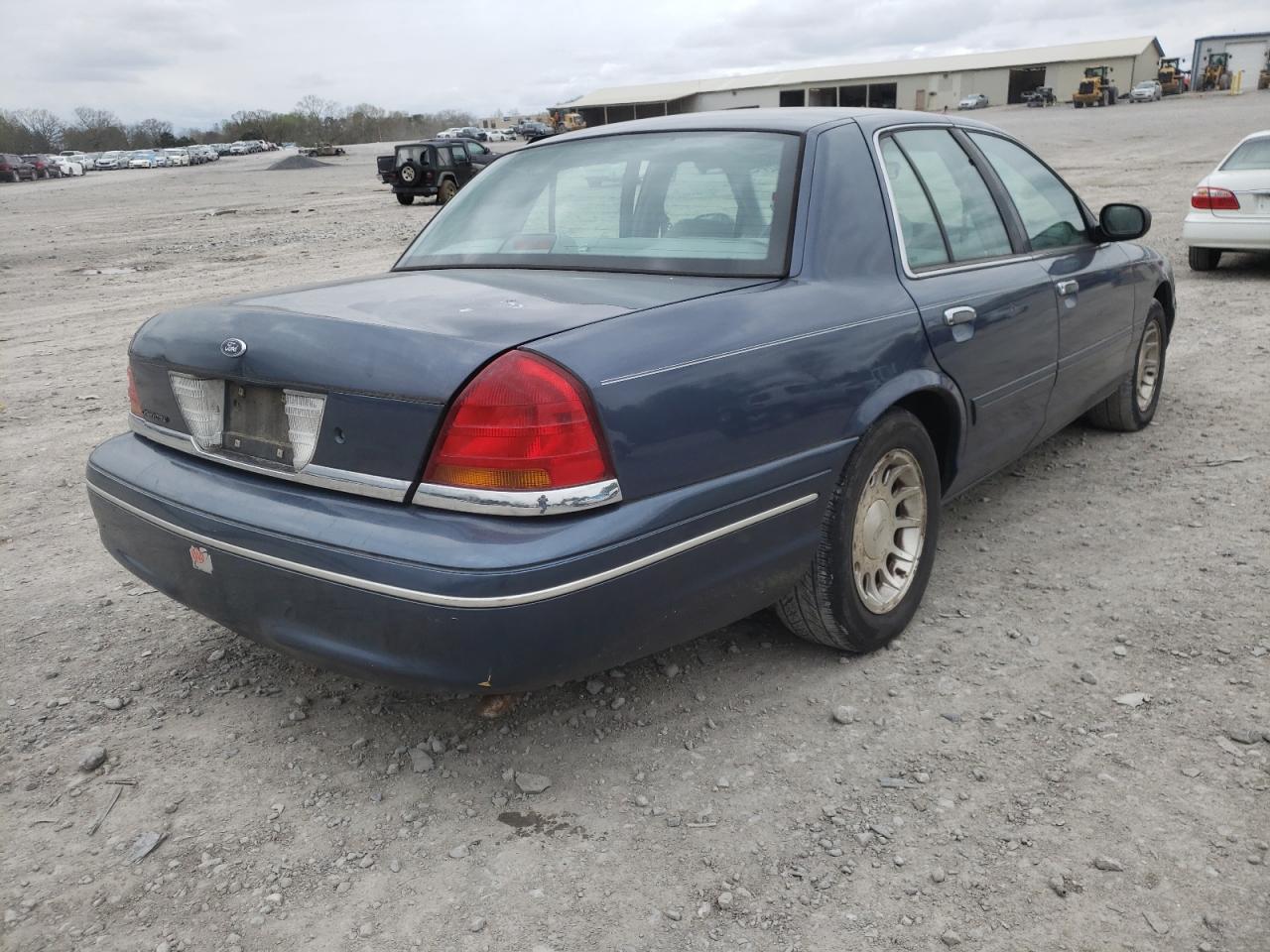 Photo 4 from auction – 1998 FORD CROWN VIC with VIN 2FAFP74W9WX165851