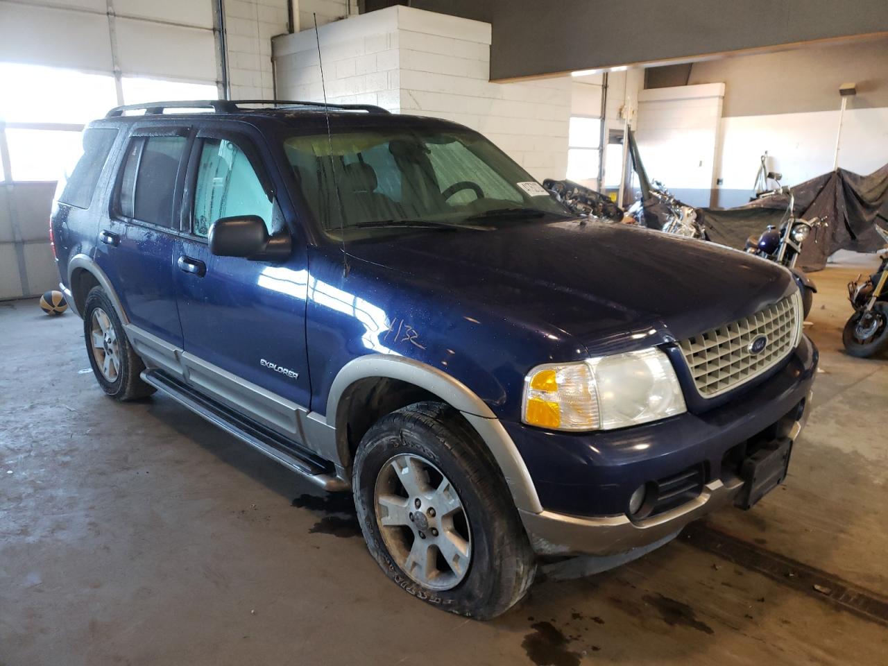 FORD EXPLORER E 2004 with VIN 1FMZU74E34UC10659 - Photo from auction