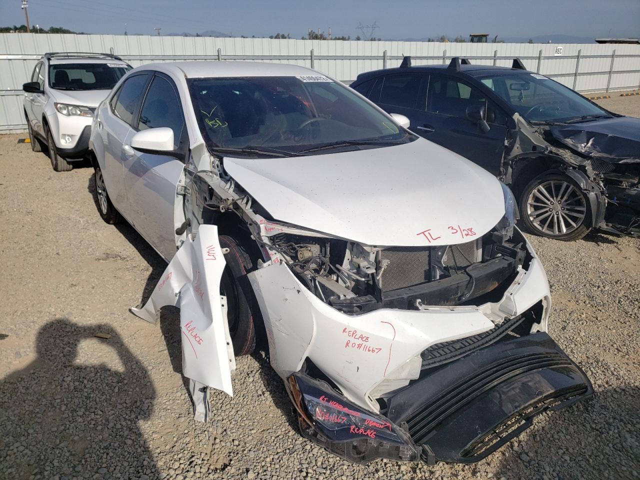 TOYOTA COROLLA LE 2018 with VIN 5YFBURHE3JP847149 - Photo from auction