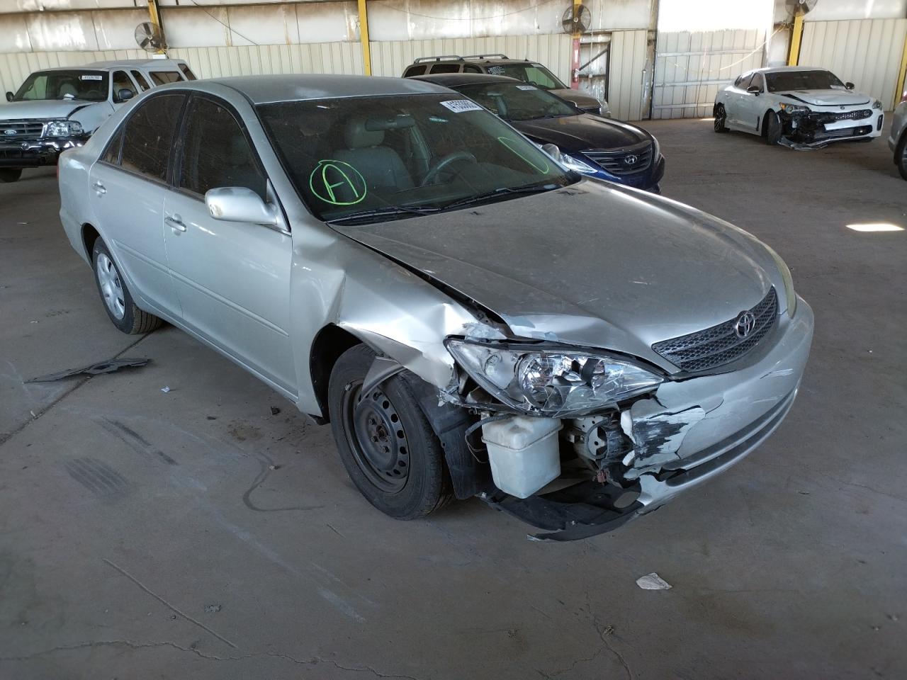 Photo 13 from auction – 2002 TOYOTA CAMRY LE with VIN 4T1BE32KX2U095751