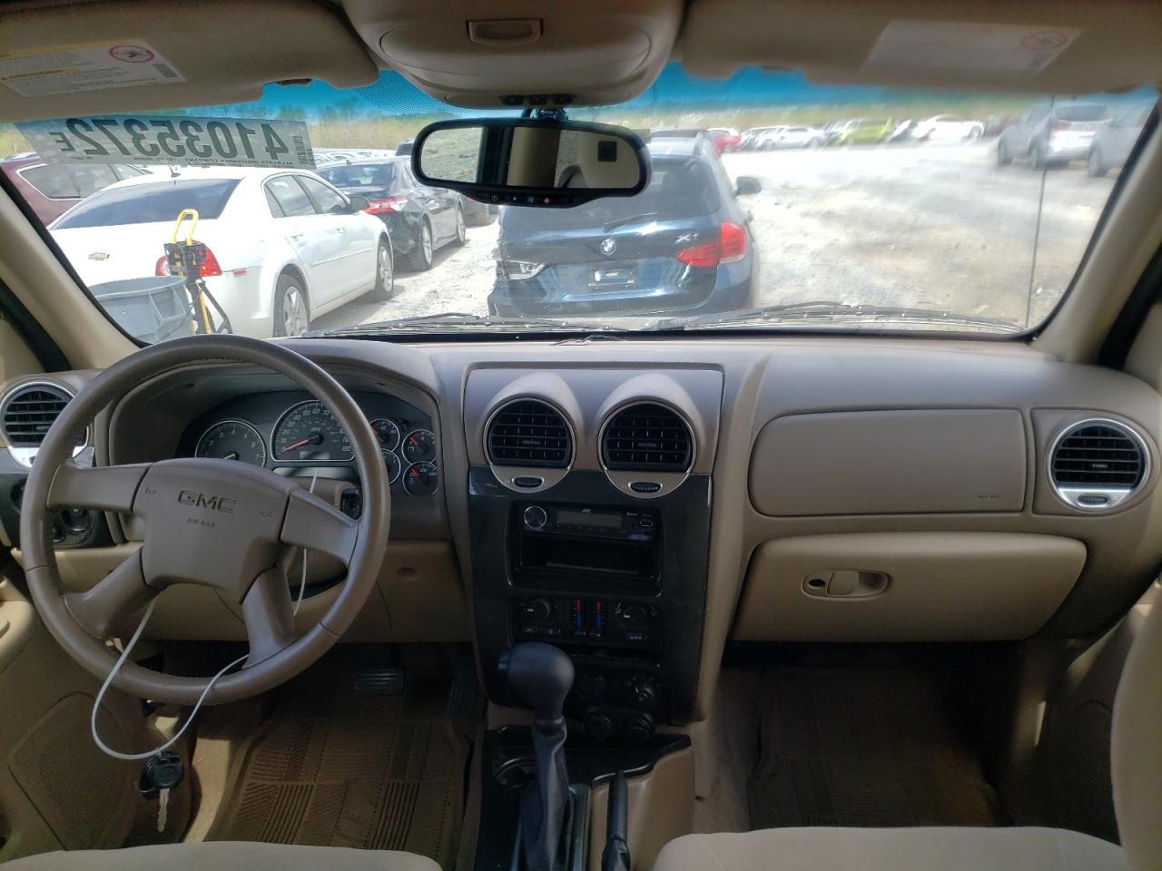 Photo 9 from auction – 2004 GMC ENVOY with VIN 1GKDS13SX42235177