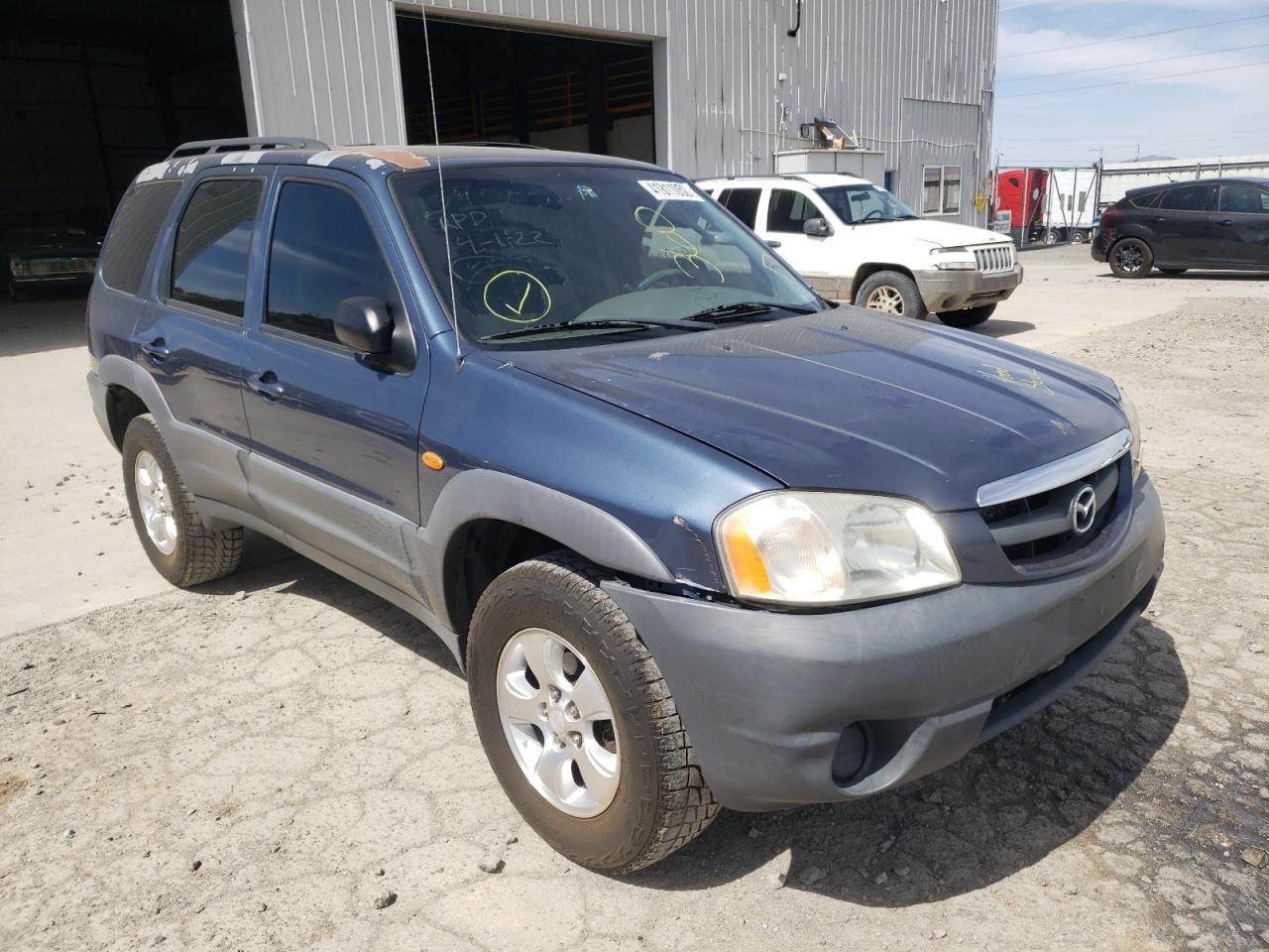MAZDA TRIBUTE DX 2001 with VIN 4F2YU071X1KM49214 - Photo from auction