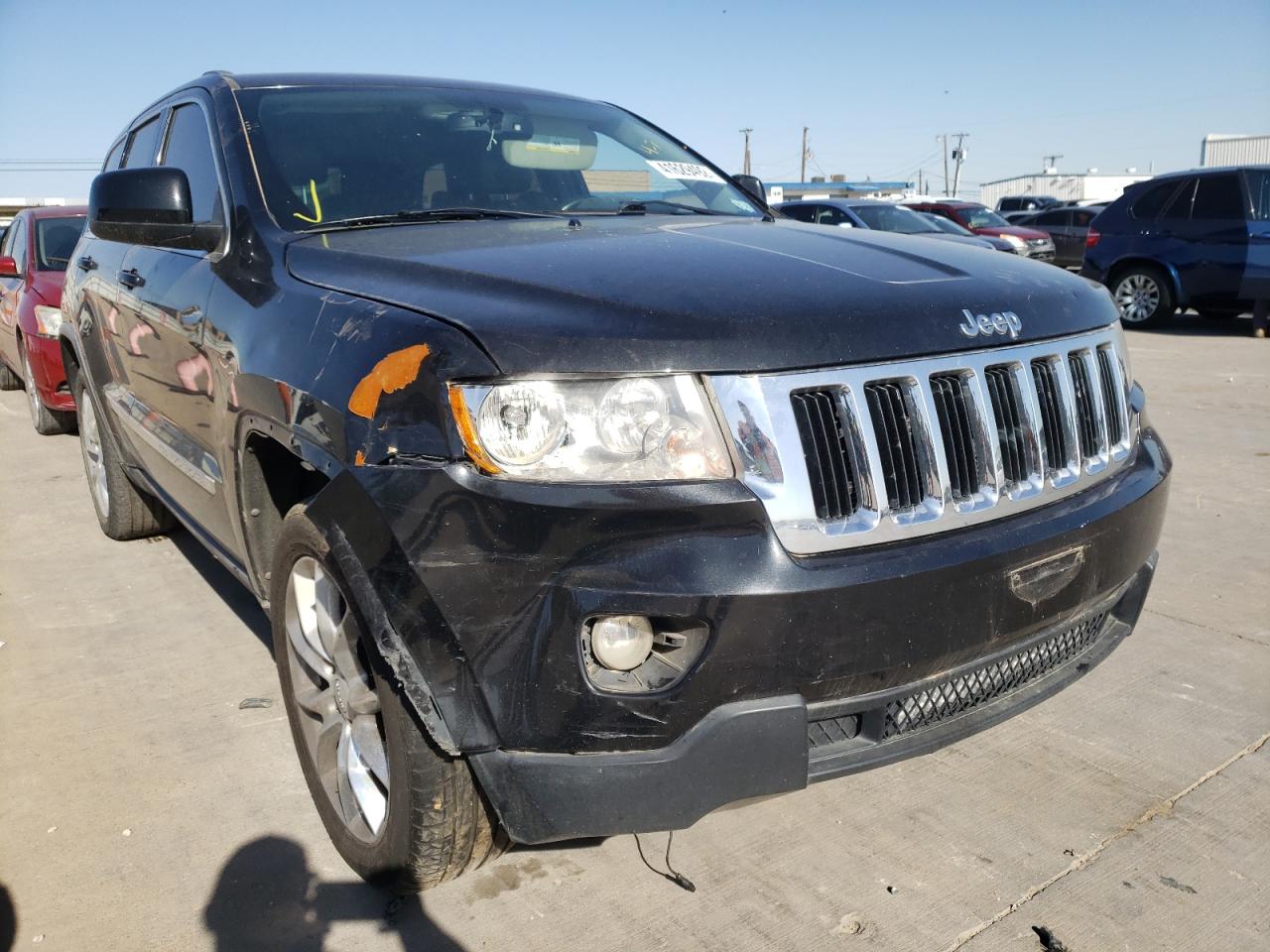 JEEP GRAND CHER 2011 with VIN 1J4RR4GT9BC543217 - Photo from auction