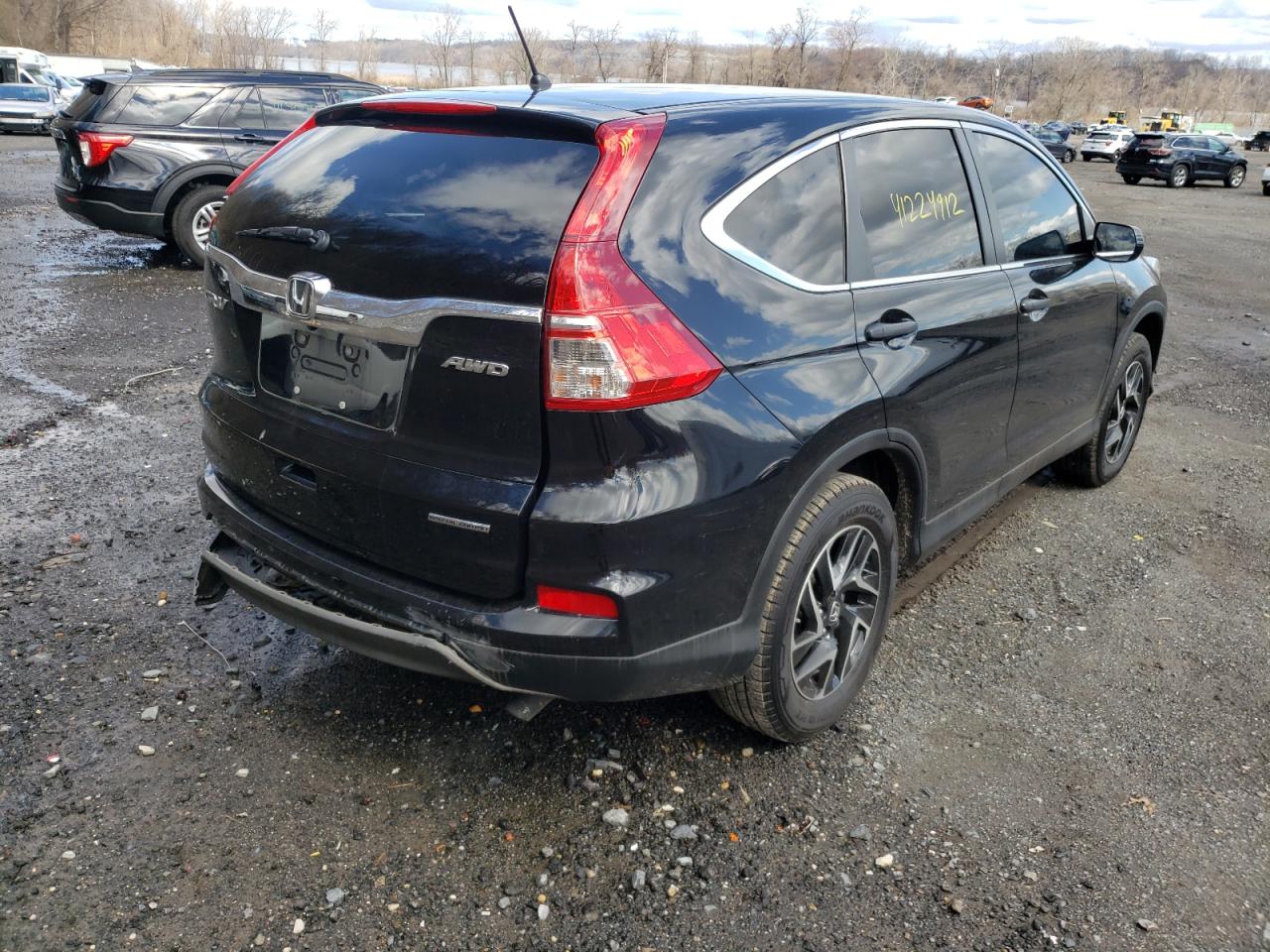 Photo 4 from auction – 2016 HONDA CR-V SE with VIN 5J6RM4H41GL026829