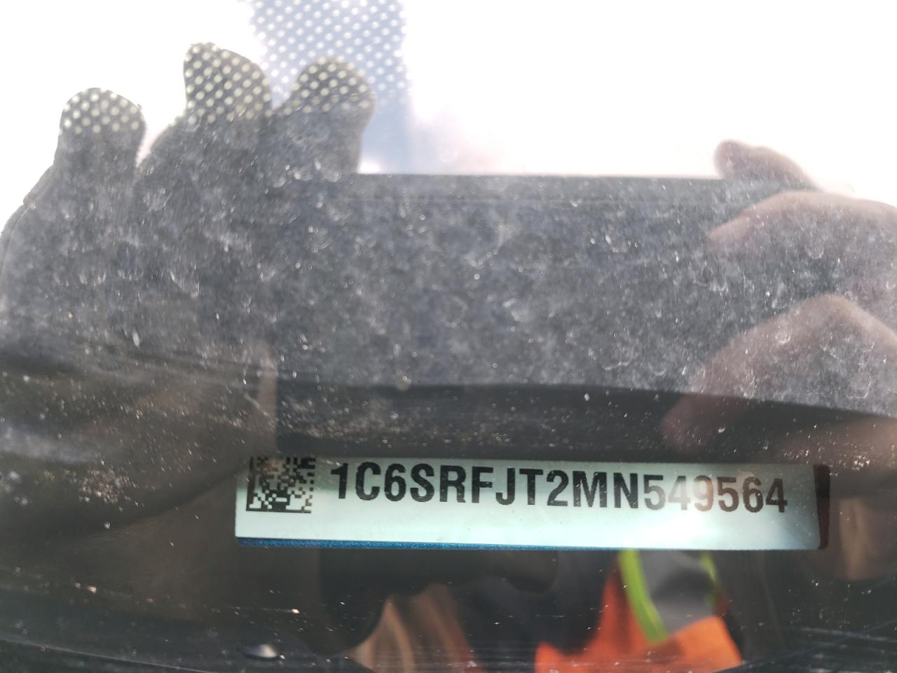 Photo 10 from auction – 2021 RAM 1500 LARAM with VIN 1C6SRFJT2MN549564