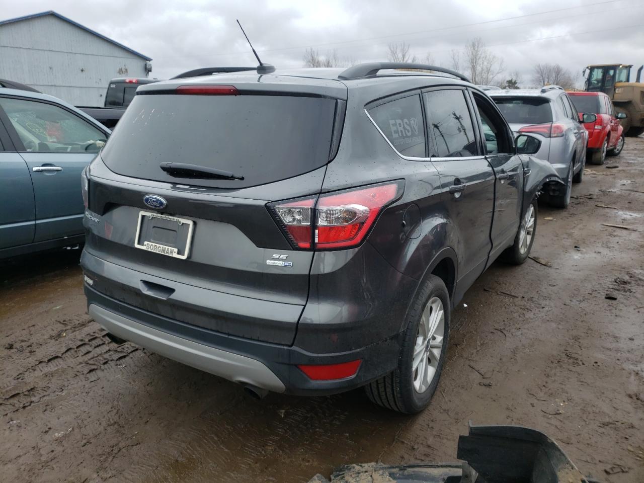 Photo 4 from auction – 2017 FORD ESCAPE SE with VIN 1FMCU9GD0HUD27402