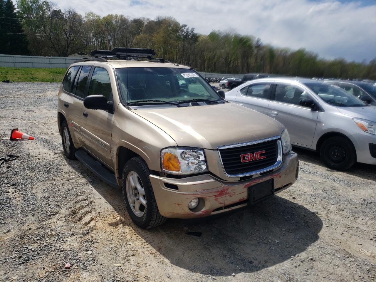 GMC ENVOY 2004 with VIN 1GKDS13SX42235177 - Photo from auction