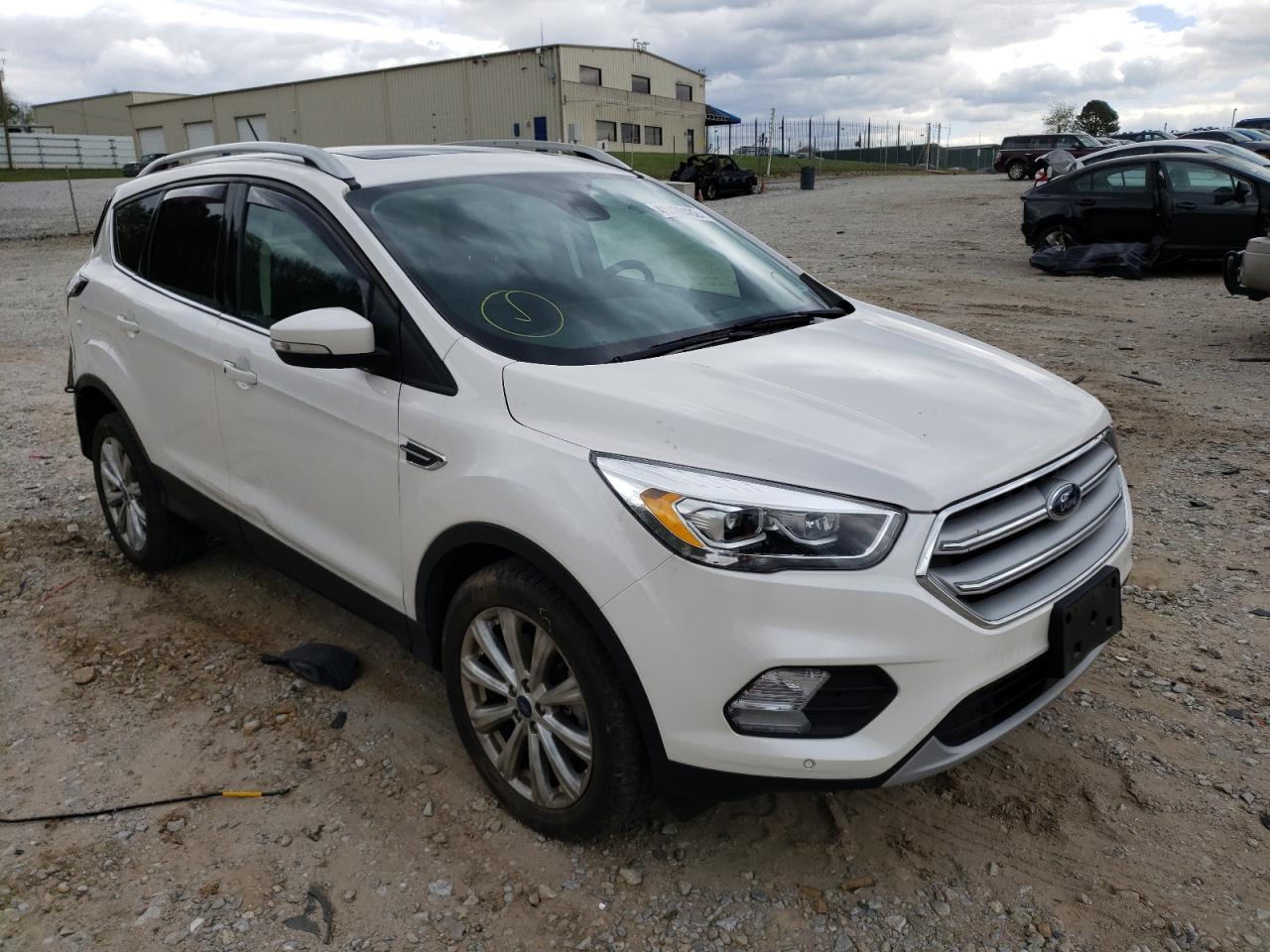 FORD ESCAPE TIT 2018 with VIN 1FMCU9J99JUA42840 - Photo from auction