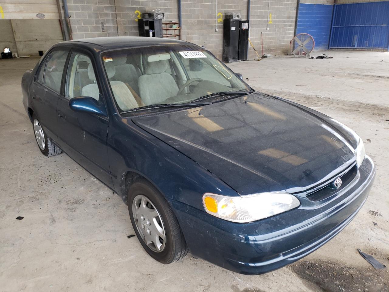 TOYOTA COROLLA 2000 with VIN 1NXBR12E7YZ359441 - Photo from auction
