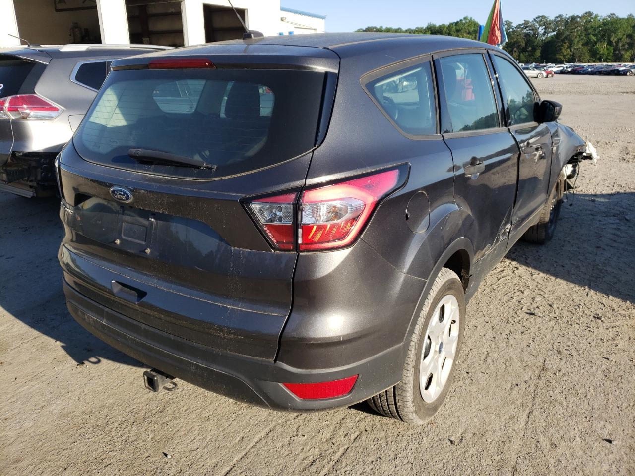 Photo 4 from auction – 2018 FORD ESCAPE S with VIN 1FMCU0F7XJUC94292