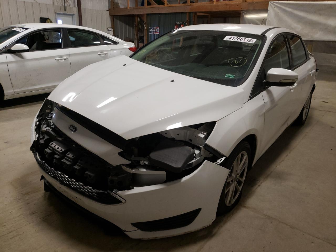 Photo 2 from auction – 2016 FORD FOCUS SE with VIN 1FADP3F21GL277424
