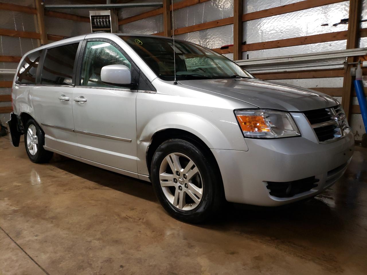 DODGE GRAND CARA 2010 with VIN 2D4RN5DX2AR446609 - Photo from auction