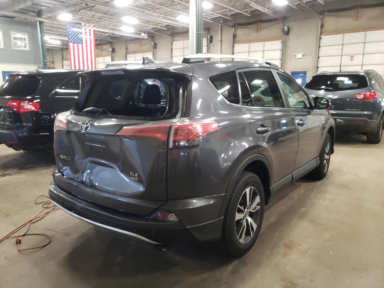 Photo 4 from auction – 2016 TOYOTA RAV4 XLE with VIN 2T3RFREV7GW425865