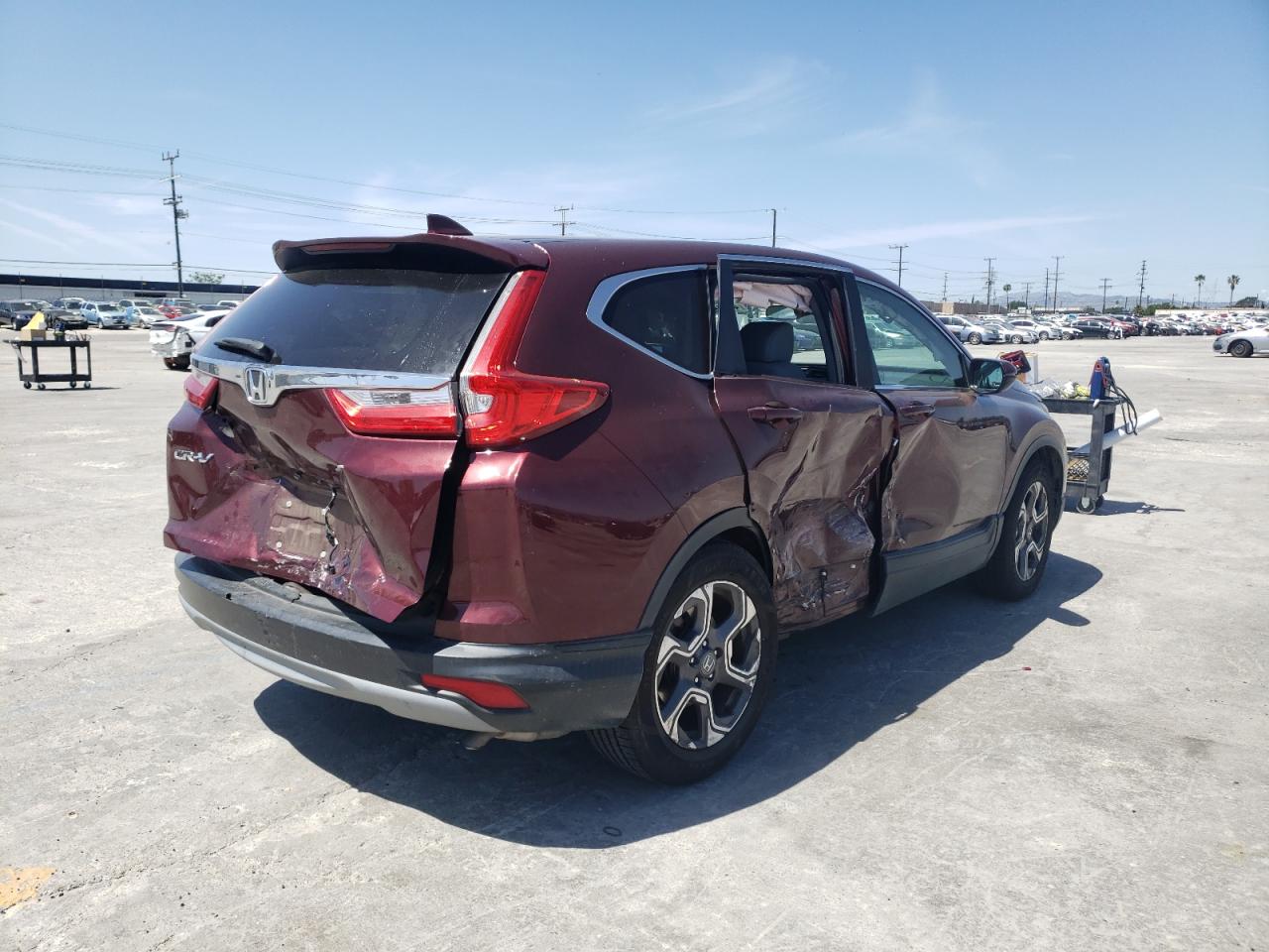 Photo 4 from auction – 2018 HONDA CR-V EX with VIN 7FARW1H52JE010564
