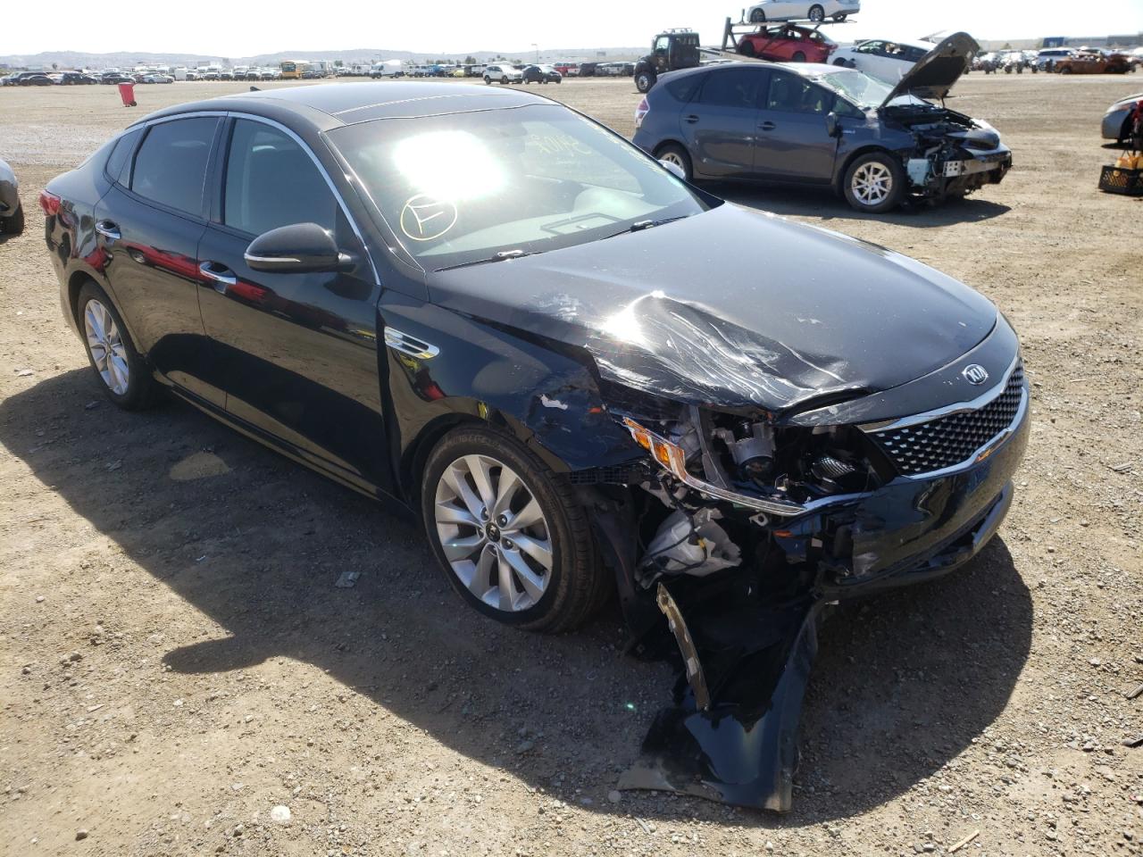 KIA OPTIMA EX 2016 with VIN 5XXGU4L34GG079665 - Photo from auction