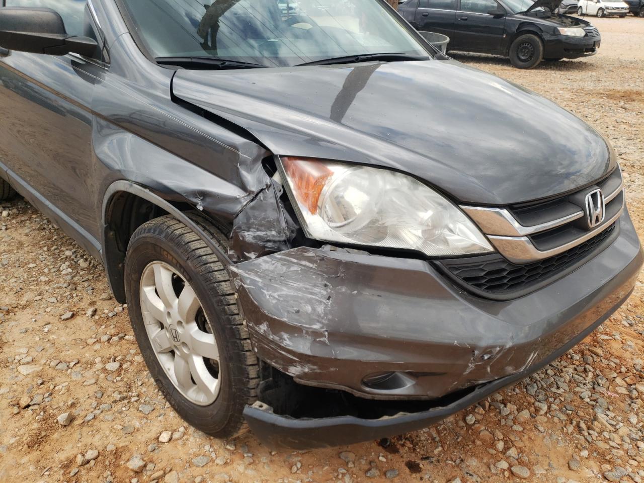 Photo 9 from auction – 2011 HONDA CR-V SE with VIN 5J6RE3H44BL035394