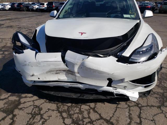 Photo 9 from auction – 2021 TESLA MODEL 3 with VIN 5YJ3E1EA0MF913290