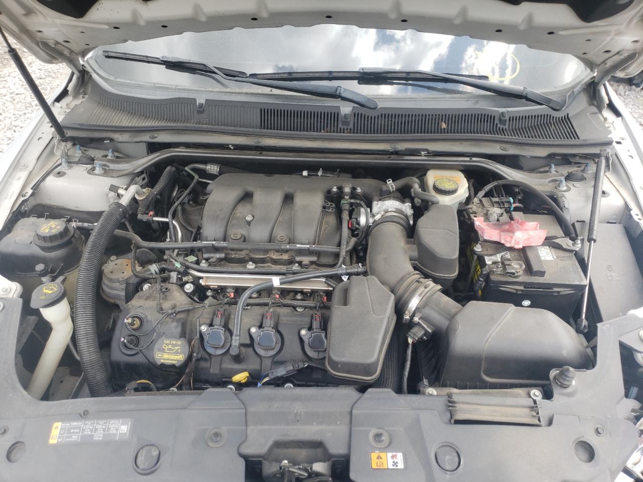 Photo 7 from auction – 2013 FORD TAURUS SEL with VIN 1FAHP2E80DG209668