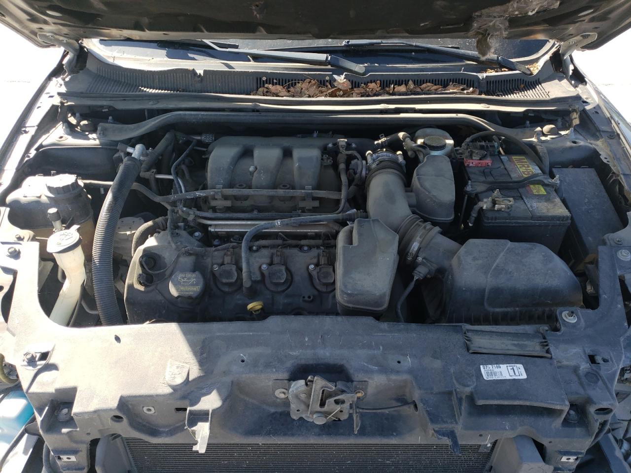 Photo 7 from auction – 2013 FORD TAURUS SEL with VIN 1FAHP2E82DG109216