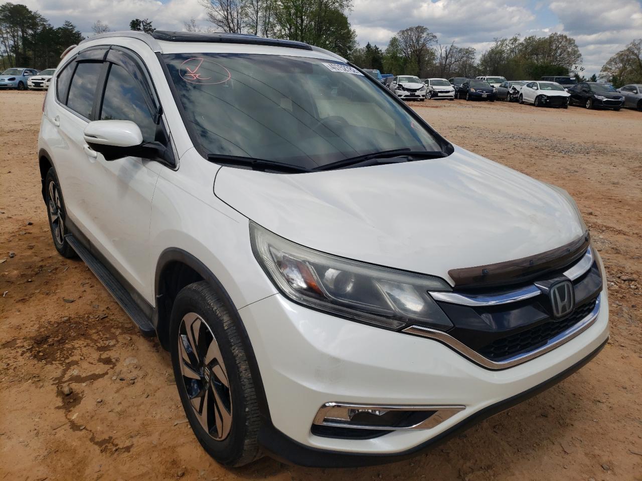 HONDA CR-V TOURI 2015 with VIN 5J6RM4H91FL117142 - Photo from auction