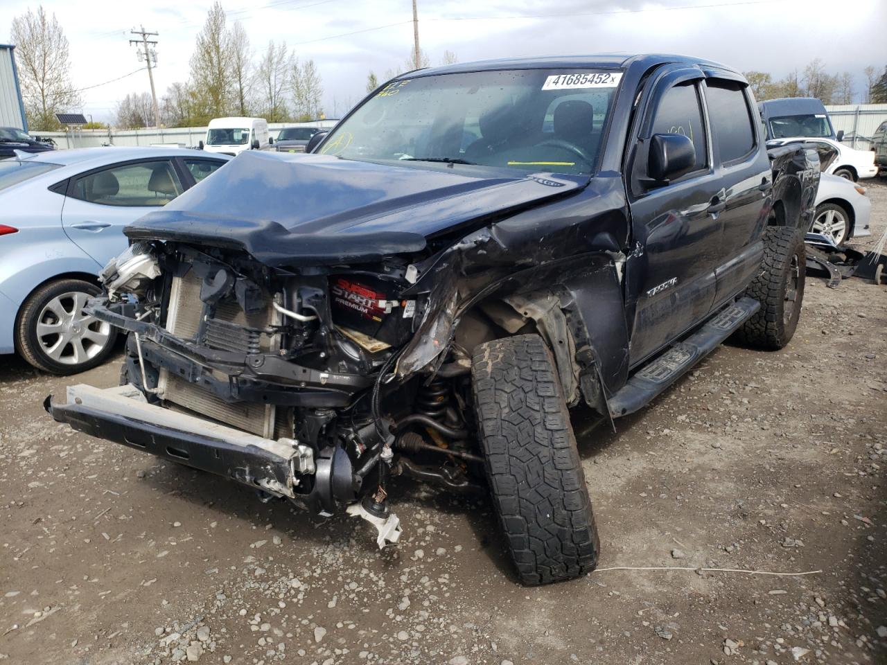 Photo 2 from auction – 2014 TOYOTA TACOMA DOU with VIN 3TMLU4EN3EM164196