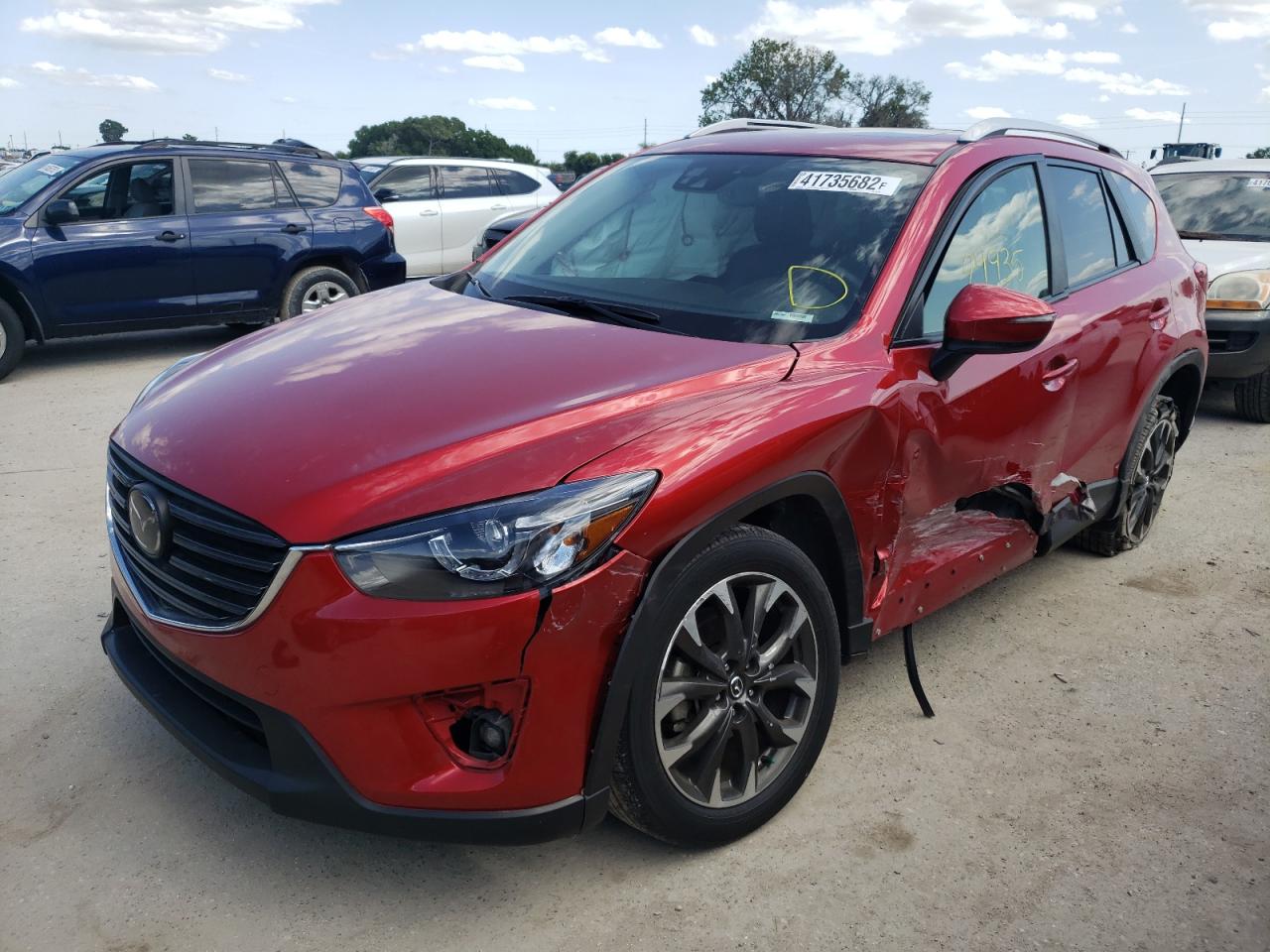 Photo 2 from auction – 2016 MAZDA CX-5 GT with VIN JM3KE2DY7G0894053