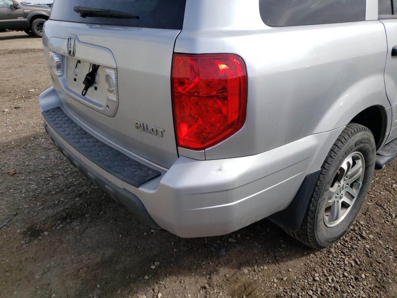 Photo 9 from auction – 2004 HONDA PILOT EX with VIN 2HKYF18434H000291