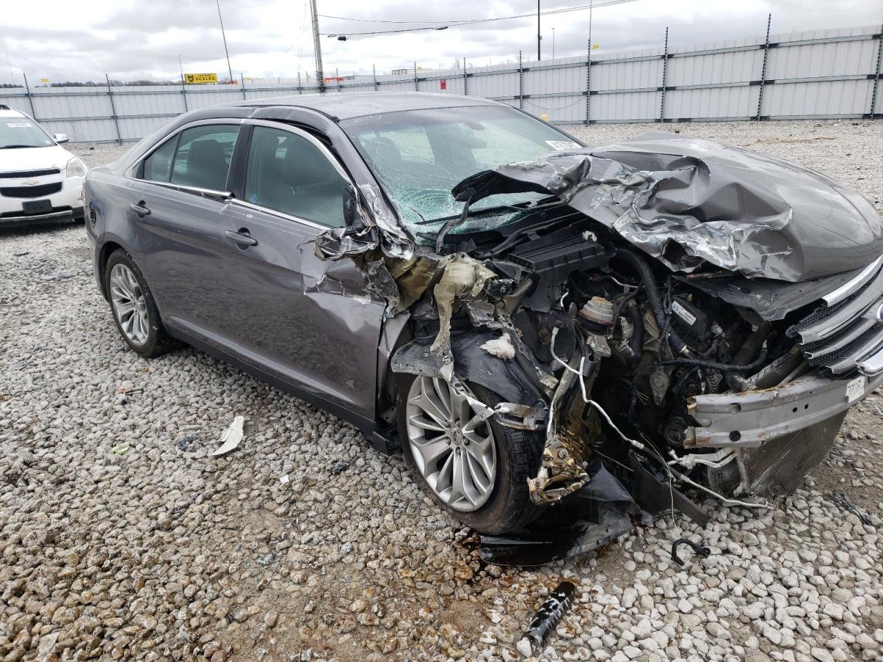 FORD TAURUS LIM 2014 with VIN 1FAHP2F88EG115344 - Photo from auction