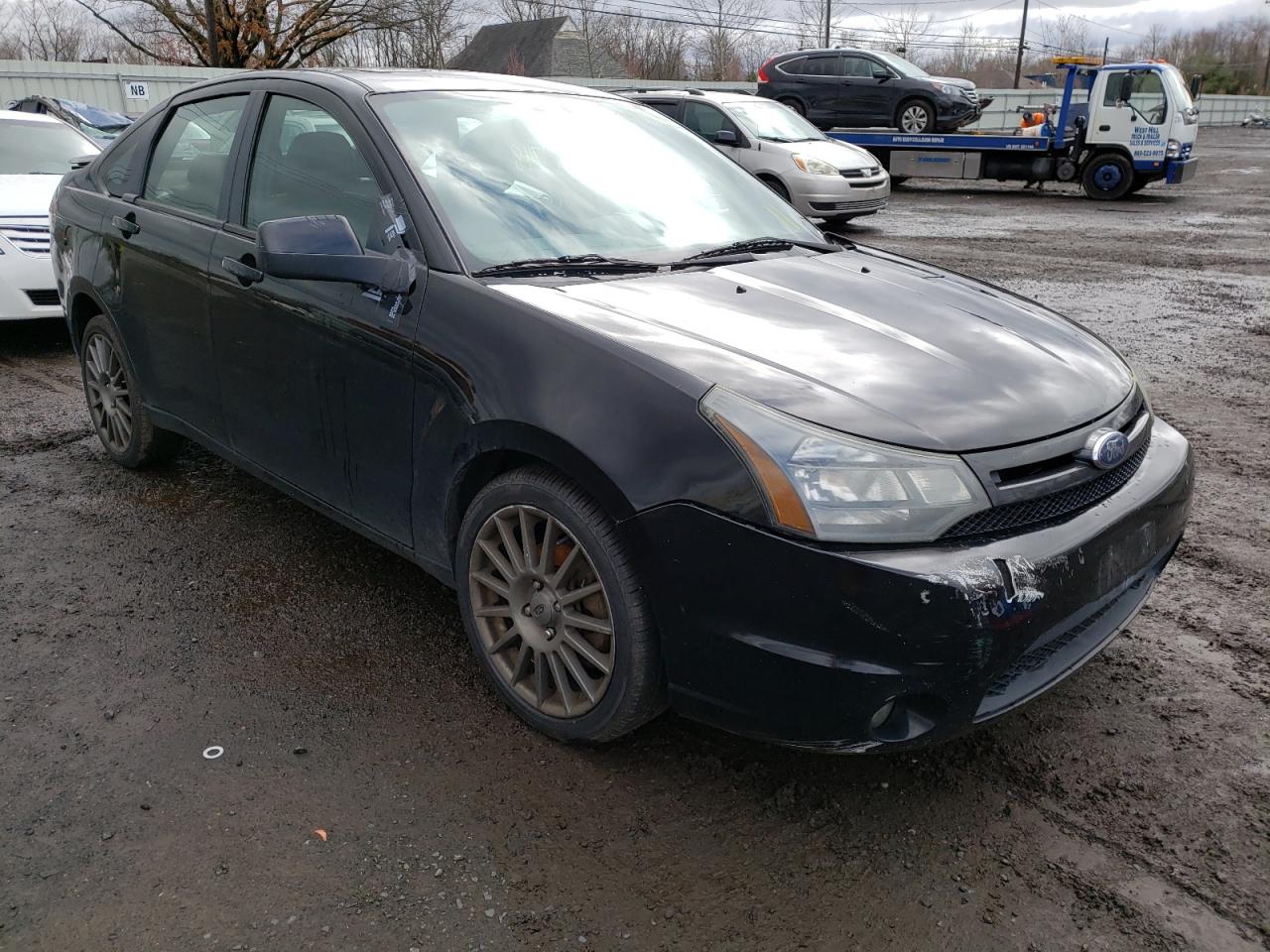 FORD FOCUS SES 2010 with VIN 1FAHP3GN0AW114960 - Photo from auction