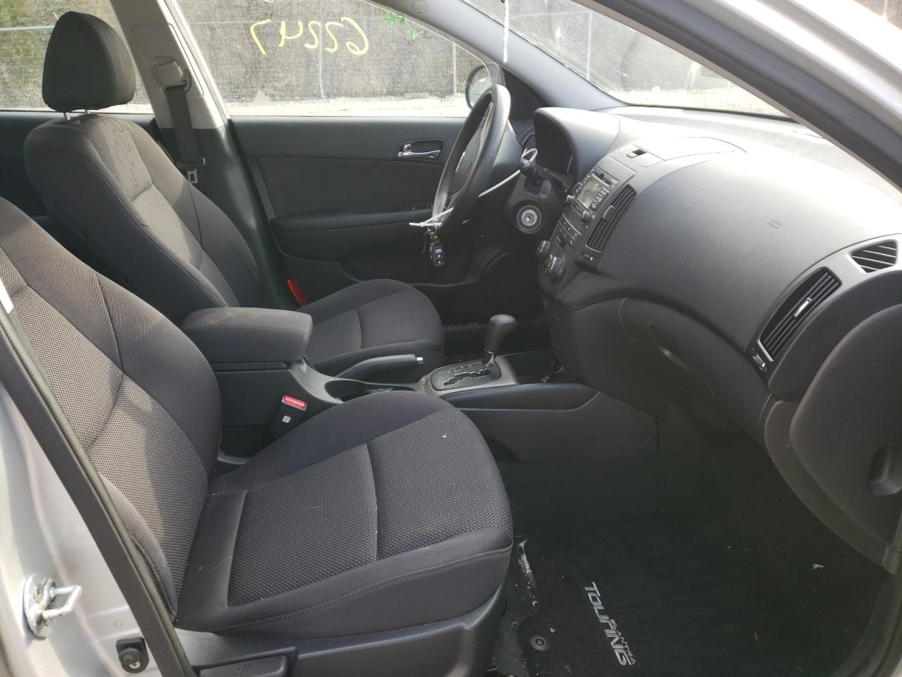 Photo 5 from auction – 2012 HYUNDAI ELANTRA TO with VIN KMHDC8AEXCU138249