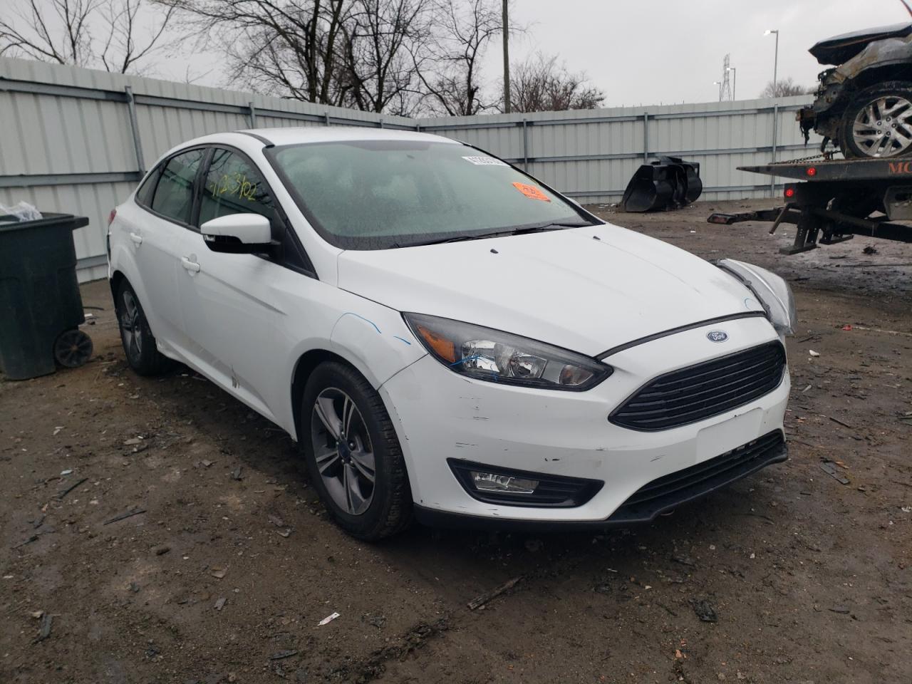 FORD FOCUS SE 2017 with VIN 1FADP3FE3HL289764 - Photo from auction