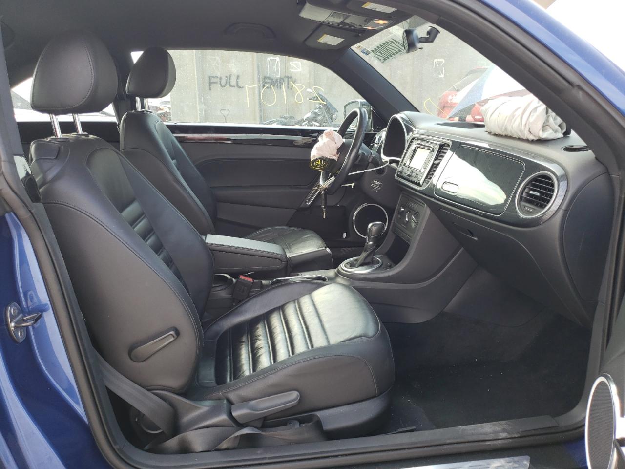 Photo 5 from auction – 2012 VOLKSWAGEN BEETLE TUR with VIN 3VWVA7AT6CM609693
