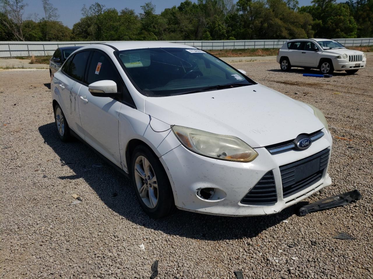 FORD FOCUS SE 2014 with VIN 1FADP3F22EL225801 - Photo from auction
