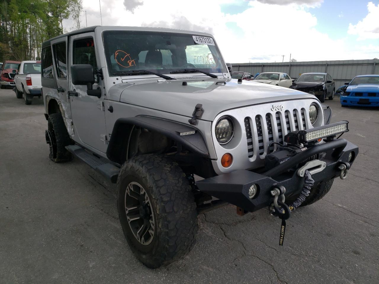 JEEP WRANGLER U 2011 مع رقم تعريف المركبة 1J4BA3H14BL583365 - صورة من المزاد