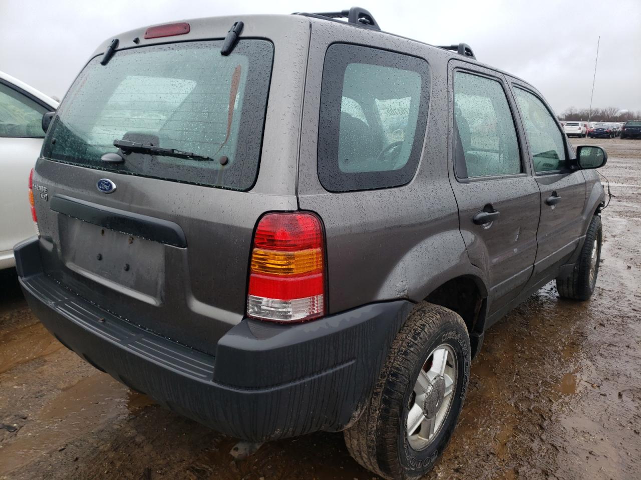 Photo 4 from auction – 2003 FORD ESCAPE XLS with VIN 1FMYU92143KC16374