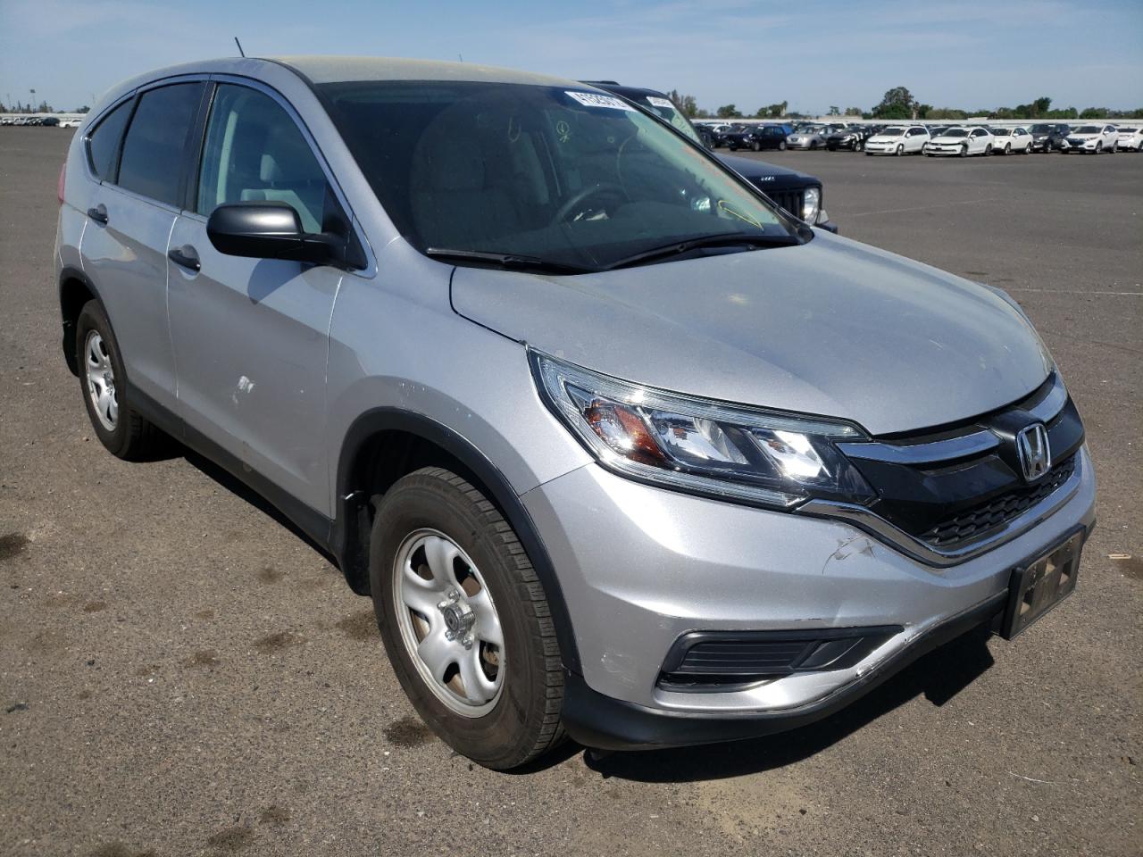 Photo 1 from auction – 2015 HONDA CR-V LX with VIN 5J6RM3H36FL002168