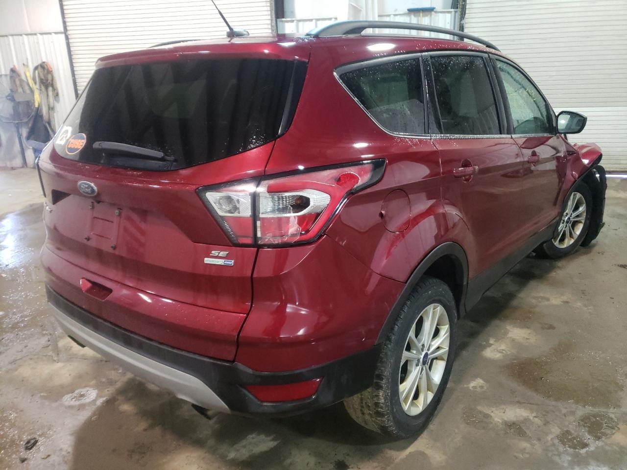 Photo 4 from auction – 2017 FORD ESCAPE SE with VIN 1FMCU9GD4HUD55929