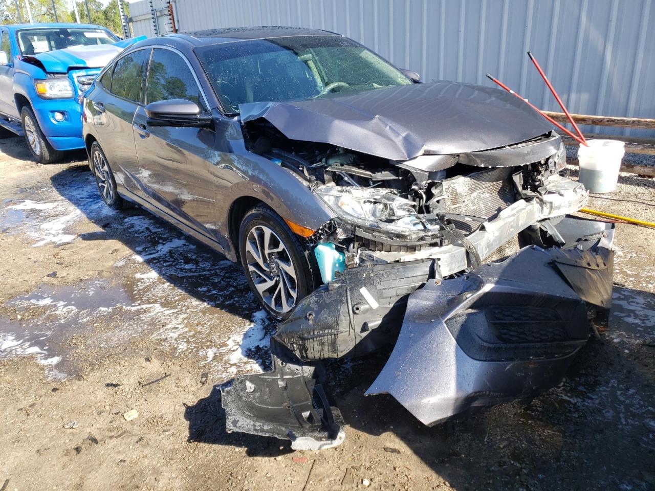 HONDA CIVIC EX 2016 with VIN 19XFC2F77GE216754 - Photo from auction