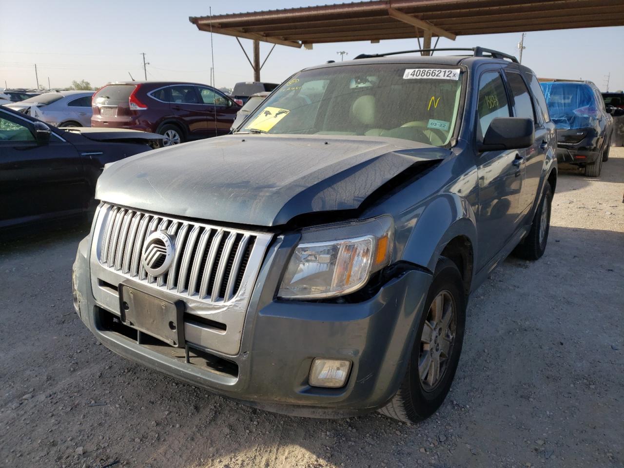 Photo 2 from auction – 2011 MERCURY MARINER with VIN 4M2CN8B77BKJ02601
