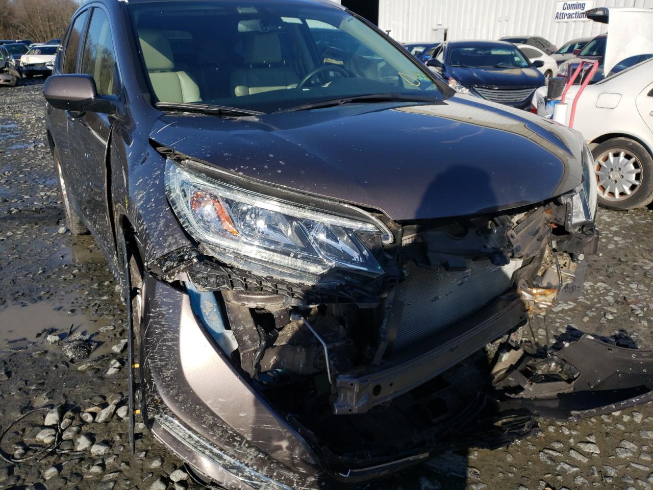 Photo 9 from auction – 2016 HONDA CR-V with VIN 2HKRM4H75GH690930