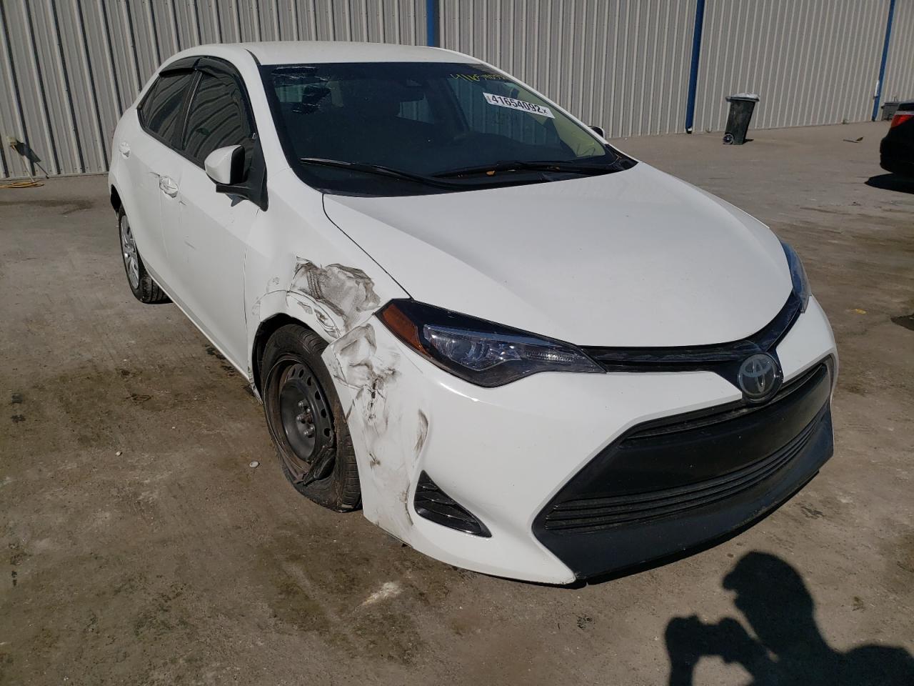 TOYOTA COROLLA L 2017 con VIN 5YFBURHEXHP671307 - Foto de la subasta