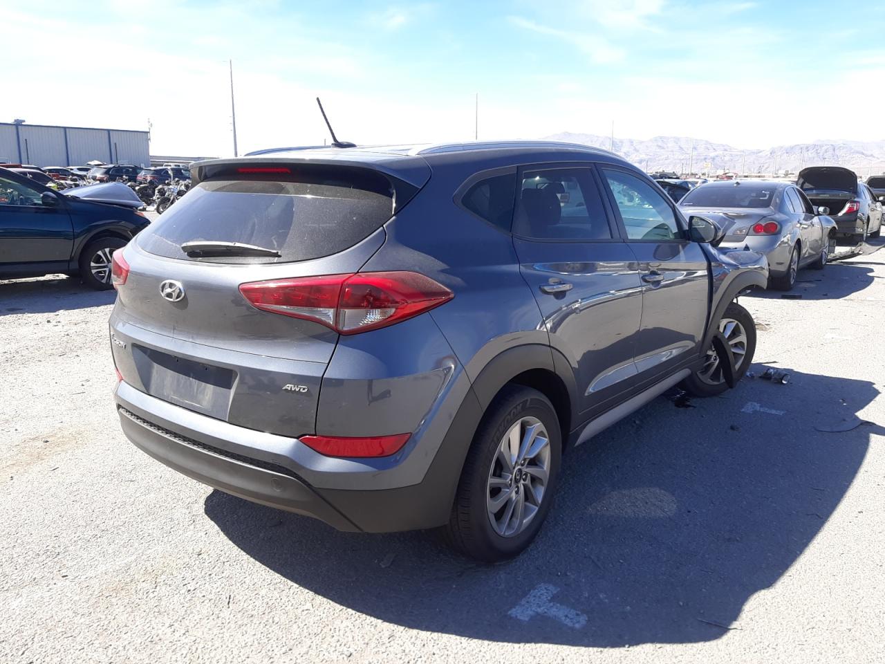 Photo 4 from auction – 2017 HYUNDAI TUCSON LIM with VIN KM8J3CA45HU448670