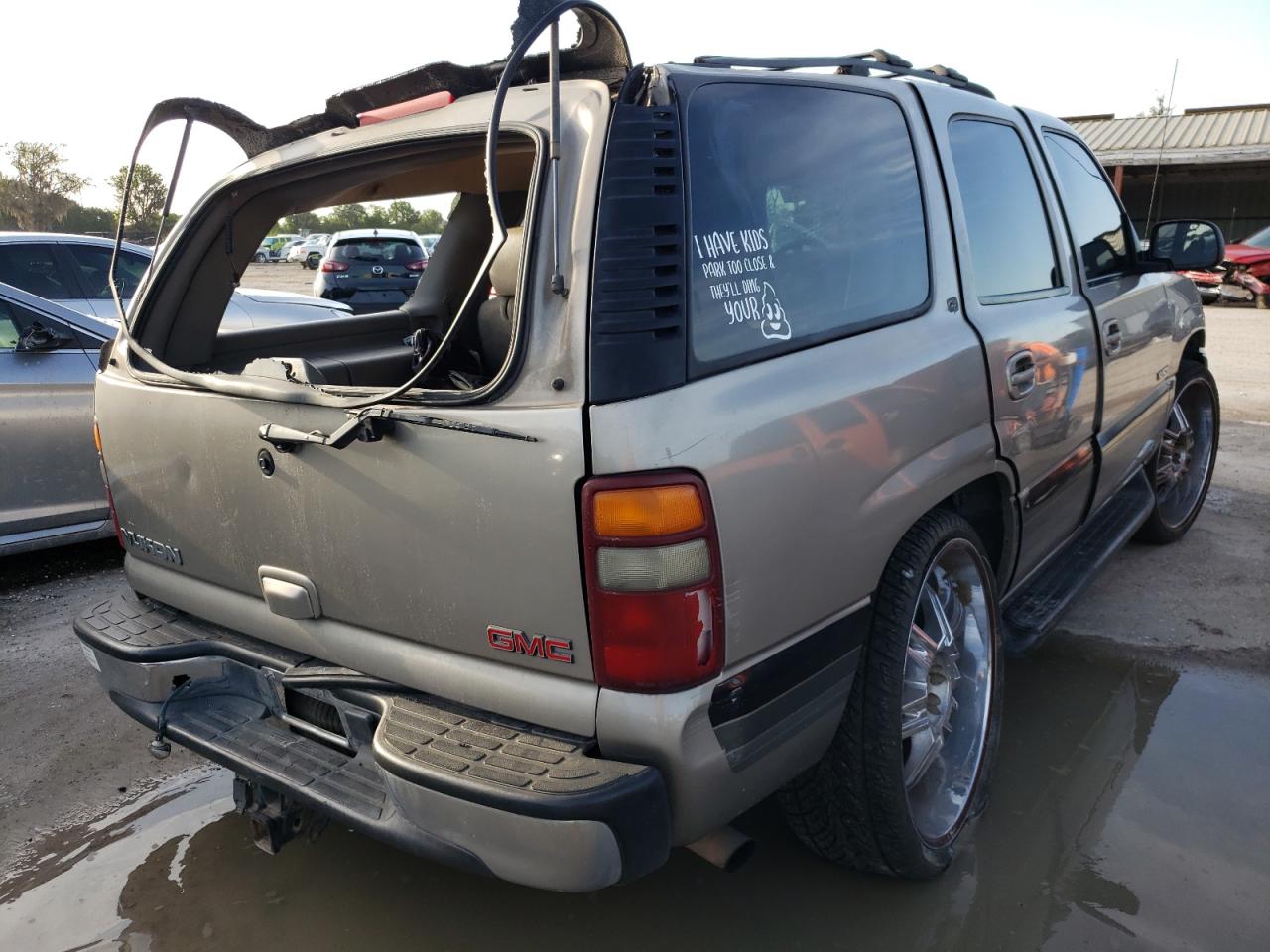 Photo 4 from auction – 2001 GMC YUKON with VIN 1GKEC13T21J188917