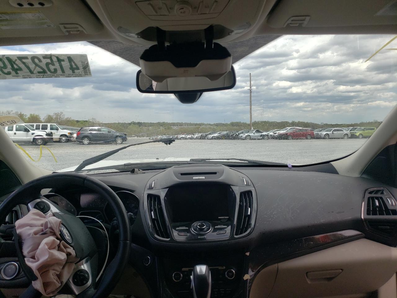 Photo 19 from auction – 2015 FORD ESCAPE TIT with VIN 1FMCU0JX8FUA56682